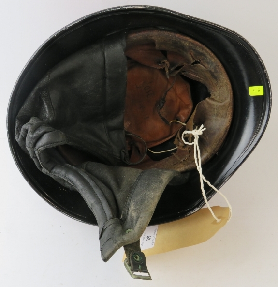 A 1970s Spanish Fire Service black steel fire helmet with brass comb and badge - Image 3 of 3