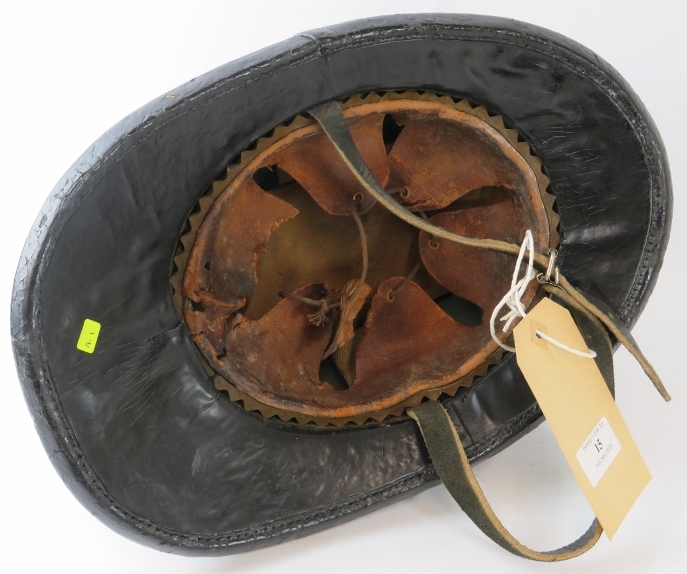 A 1970s Belgian Fire Service black cork fire helmet with brass badge. - Image 3 of 3