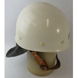 A 1980s Czechoslovakia Fire Service white ABS fire helmet with leather neck cowl