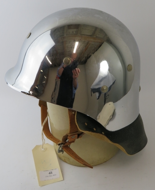A 1980s West German polished chrome fibreglass fire helmet with leather neck cowl - Image 2 of 3