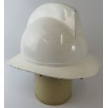 A 1970s white Belgian Fire Service fibreglass fire helmet