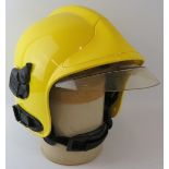 A modern MSA Gallet ABS fire helmet with reflective integrated visor system