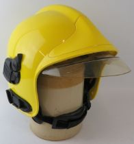 A modern MSA Gallet ABS fire helmet with reflective integrated visor system