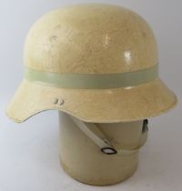 A 1970s German style fibreglass fire helmet