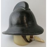 A 1970s British black cork fire helmet (unbadged)