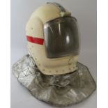 A 1980s British RAF crash fire helmet with sliding visor and heat reflective neck cowl.