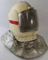 A 1980s British RAF crash fire helmet with sliding visor and heat reflective neck cowl.