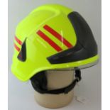 A 2000 Rosenbauer Heros-Xtreme fire helmet with integrated visor