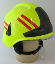 A 2000 Rosenbauer Heros-Xtreme fire helmet with integrated visor