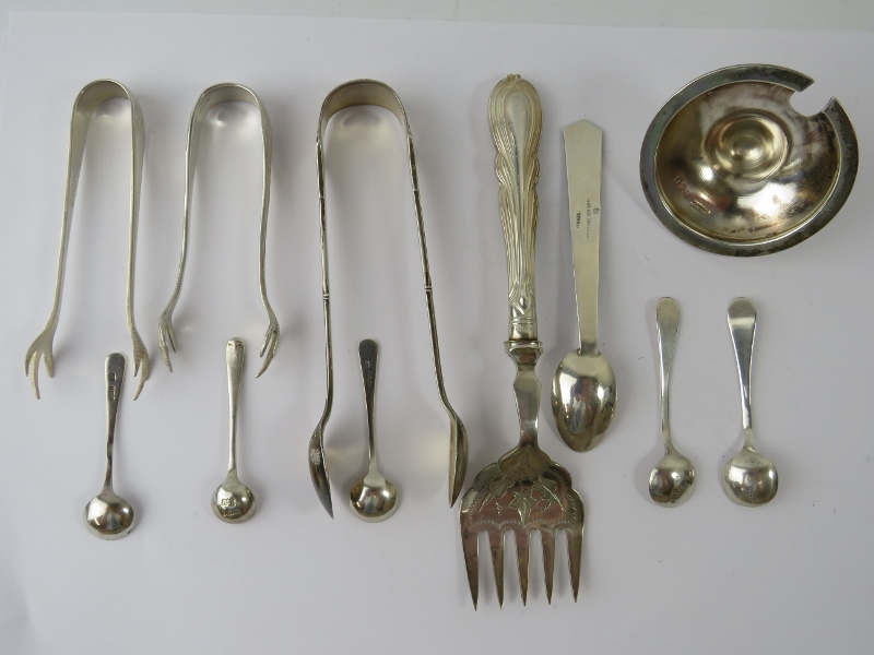 Three pairs of silver sugar tongs, five silver salt spoons, an Israeli silver coffee spoon, a silver - Image 2 of 2