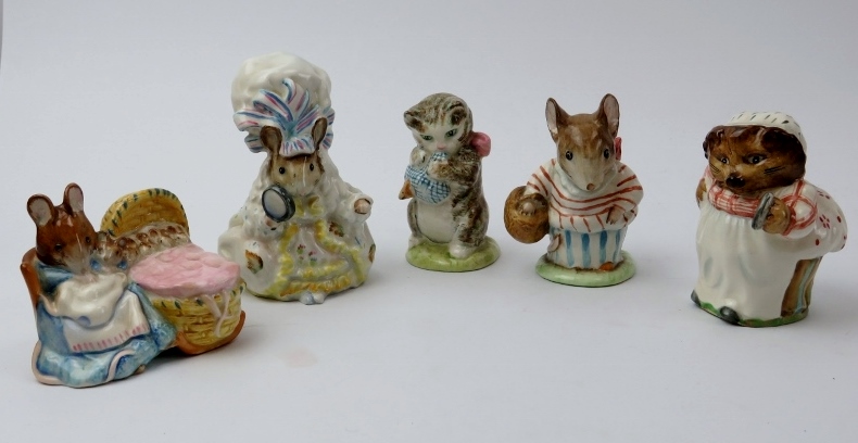 Five vintage Beatrix Potter Beswick ceramic figurines. Comprising Lady Mouse, Hunca Munca, Mrs Tiggy