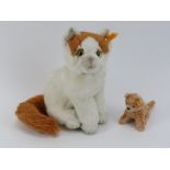 Two Steiff cats. Comprising a Steiff Niki Turkish van cat (099465) and a Katze Kitty cat (112027).