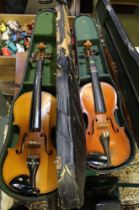 Cased full size violin and bow together with a cased small violin and bow