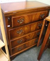 A reproduction mahogany veneer bachelor chest, with foldover top, fitted four drawers, 62cm wide