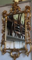 A modern Rococo design wall mirror