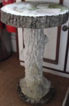 Cast concrete tree form bird bath