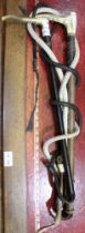 A Ladies Hunting Whip by 'Merry, 43 Dover St, W.1.' with antler grip,
