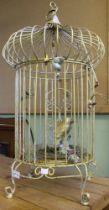 A gilded decorative bird cage