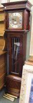 Mahogany cased Grandmother clock, column mounted hood, face with silver chaptering, Roman numerals,
