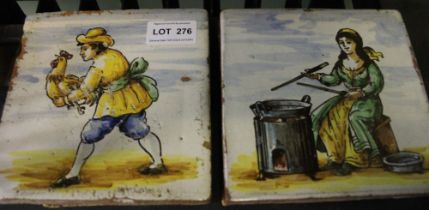 A pair of tin glazed terracotta tiles probably Dutch 15cm square