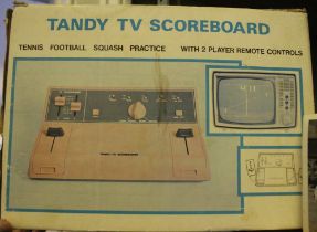 A boxed original 'Tandy' retro TV games console (battery powered)