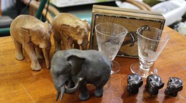 Japanese bronze elephant, 7.5cm high, together with five wooden elephants, a pair of 'Roland Ward' e