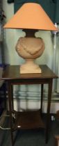 Edwardian mahogany inlaid lamp table 72cm high together with a terracotta lamp