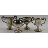 A collection of four mid-twentieth century silver trophy cups, various hallmarks, engraved, combined