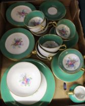 A Limoges part tea set, jade green edge with floral decoration