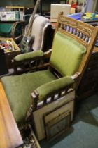 Late 19th century oak and green velour fireside chair