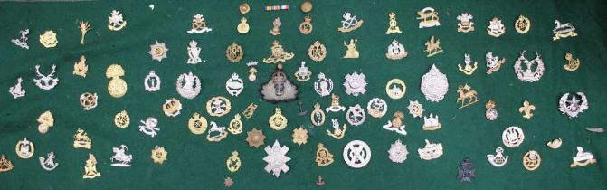 A quantity of military cap badges includes, York and Lancaster, Lincolnshire