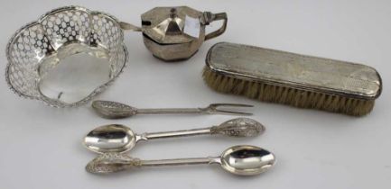 A silver bon-bon dish of pierced lobed form, a silver mustard pot with hinged cover, silver handled