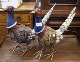 A pair of decorative painted metal freestanding pheasants