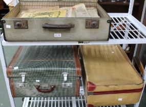 Three vintage suitcases containing collectors newspapers