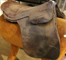 A vintage leather horse riding saddle