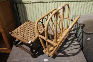 A bamboo magazine rack with low woven top stool