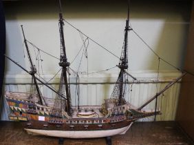 A painted wood model galleon, 56cm high