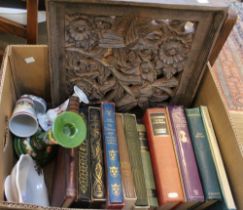 A collection of domestic items to include Folio Society books and a carved wooden wall panel