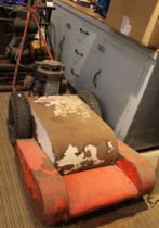 A large vintage paddock mower with Briggs and Stratton petrol engine