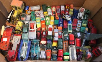 A box containing a selection of play worn die-cast models mostly cars