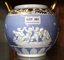 A Spode globular vase with lid, decorated in the Wedgwood style, on the blue body are applied scenes