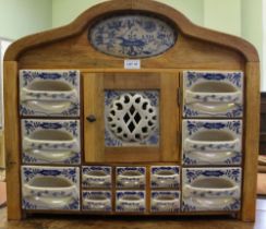 A Continental wooden set of spice drawers