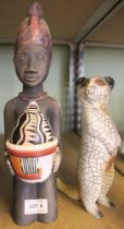 A Raku African kneeling figure 35cm high together with a Meercat (2)