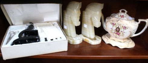 An onyx book-ends, a microscope in original box and a tea pot on stand