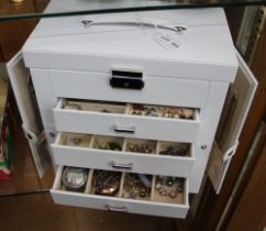A white jewellery box containing costume jewellery and watches