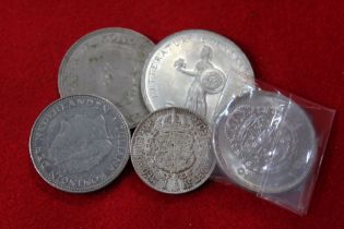 Five silver continental coins