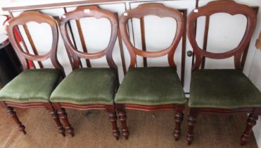 A set of six green upholstered balloon back chairs