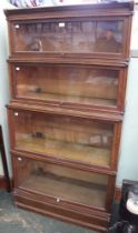 Amyl - sectional glazed fronted bookcase two large and two smaller sections