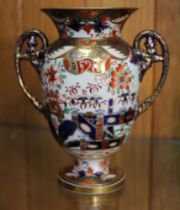 A Spode baluster shaped vase, with flared lip and applied handles, decorated in the Imari palette, 1