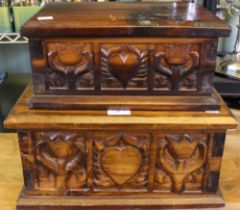 Two small hardwood ornately carved boxes